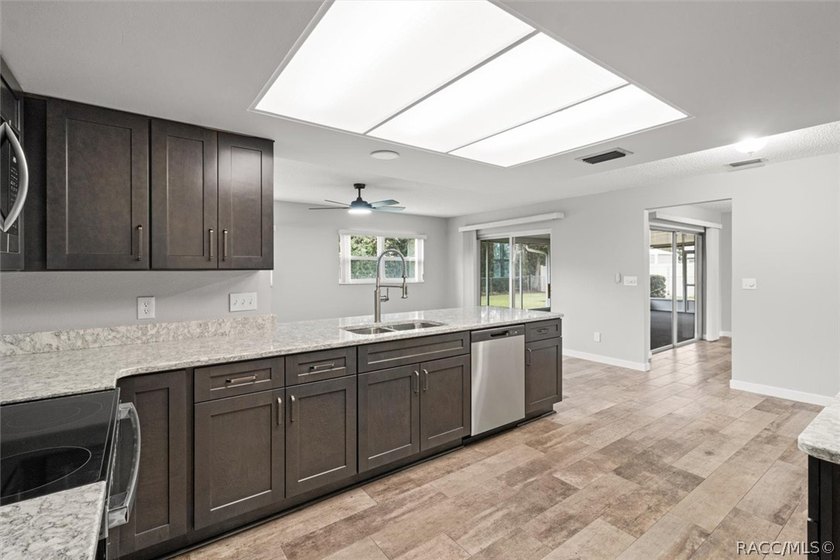This beautifully remodeled home is right in the HEART of golf - photo 32