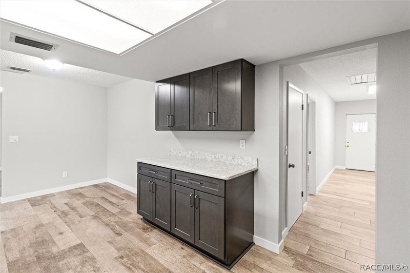 This beautifully remodeled home is right in the HEART of golf - photo 33