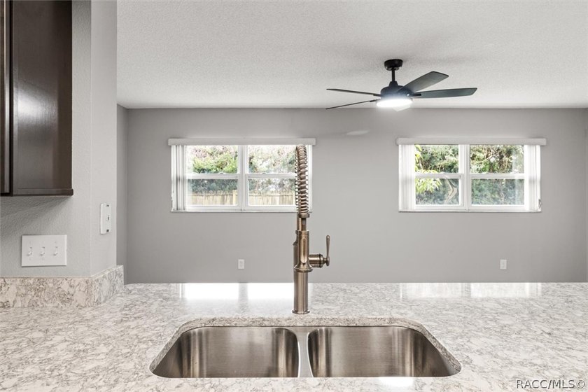 This beautifully remodeled home is right in the HEART of golf - photo 34