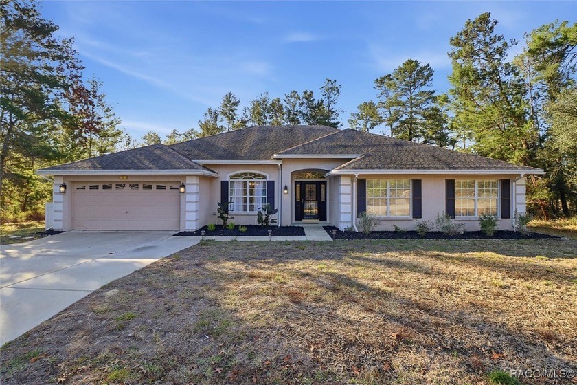 Welcome to this spacious 4-bedroom, 3 full bathroom home located - photo 2