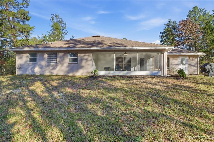 Welcome to this spacious 4-bedroom, 3 full bathroom home located - photo 5