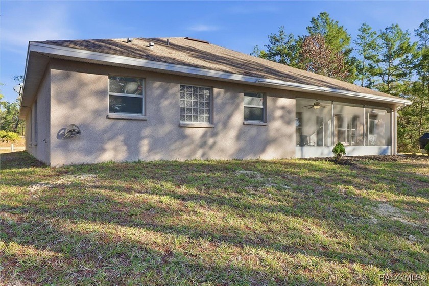 Welcome to this spacious 4-bedroom, 3 full bathroom home located - photo 6