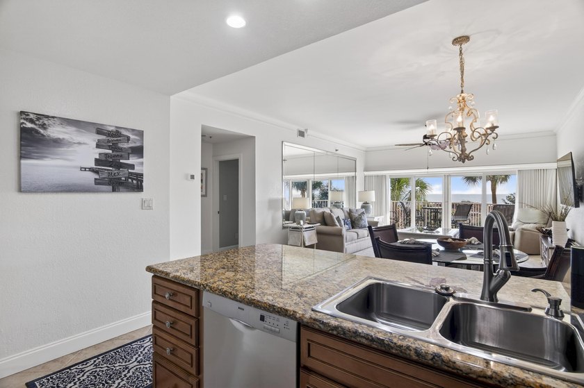 Experience coastal living at its finest with this gulf-front - photo 11