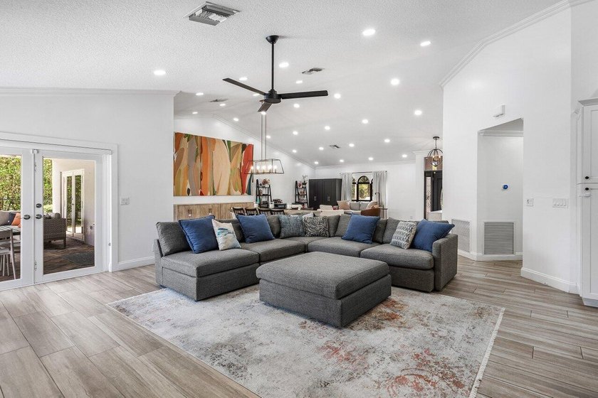 Stunning, fully renovated 4 BD, 2.5 BA residence situated on an - photo 7