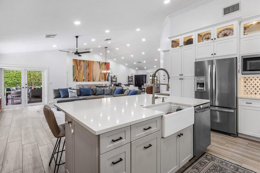 Stunning, fully renovated 4 BD, 2.5 BA residence situated on an - photo 9
