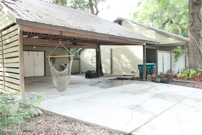 This home features an open floor plan, lots of shade from the - photo 5