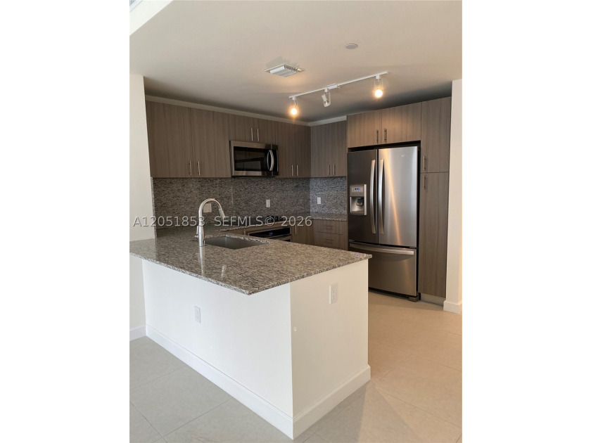 Experience the best of Downtown Doral in this beautiful - photo 6