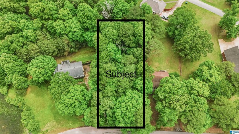 Build your dream home on this beautiful wooded 0.46-acre lot in - photo 2