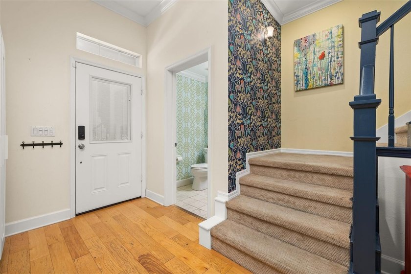 Located in Celebration, this 3-bedroom, 2.5-bathroom home backs - photo 8
