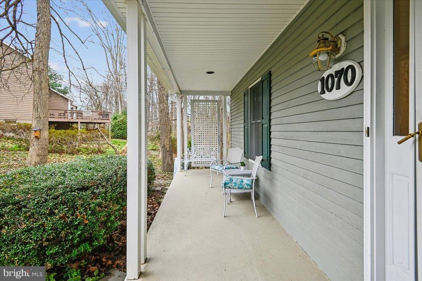 Tucked away on a quiet, wooded homesite, this beautiful 4BR/3 - photo 3
