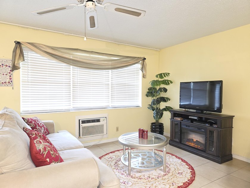 Well-maintained 1-bedroom, 1.5-bath residence featuring granite - photo 11