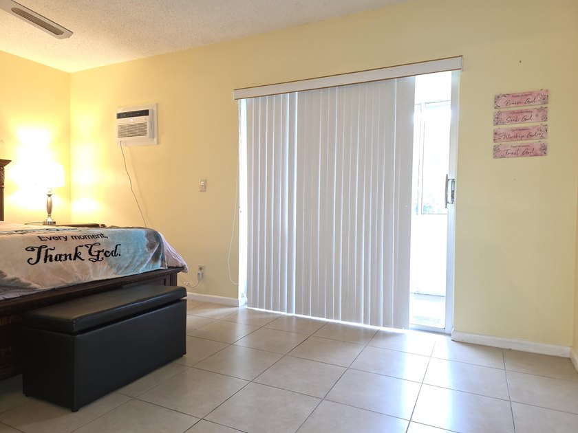 Well-maintained 1-bedroom, 1.5-bath residence featuring granite - photo 20