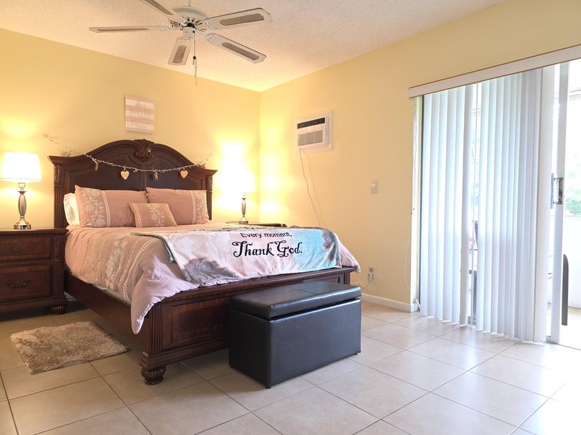 Well-maintained 1-bedroom, 1.5-bath residence featuring granite - photo 22