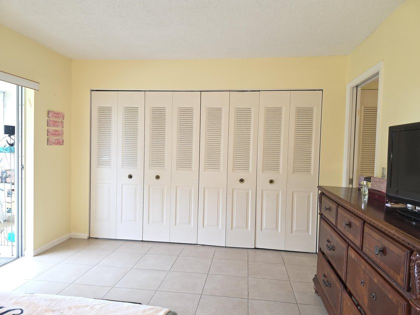 Well-maintained 1-bedroom, 1.5-bath residence featuring granite - photo 25
