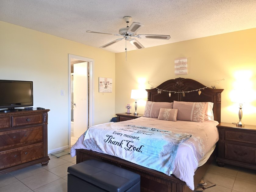 Well-maintained 1-bedroom, 1.5-bath residence featuring granite - photo 27