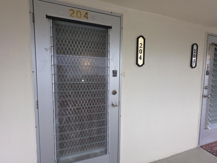 Well-maintained 1-bedroom, 1.5-bath residence featuring granite - photo 33