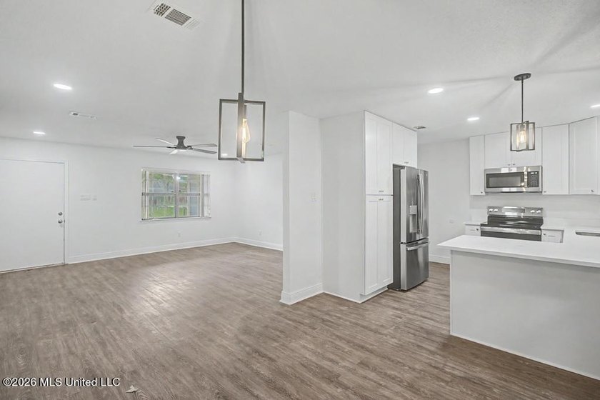 Beautifully updated and move-in ready! This remodeled home - photo 3