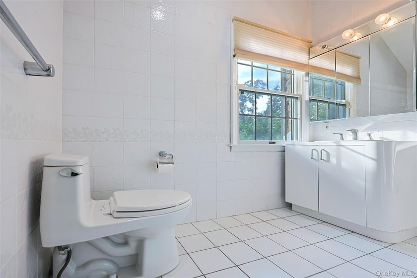 Located in the highly desirable Village of Lake Success, this - photo 22