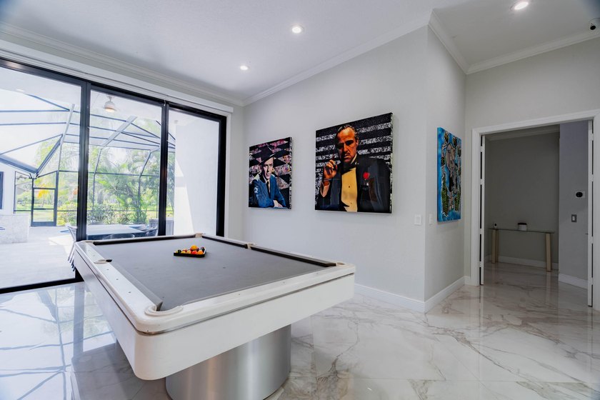 Welcome to this fully renovated lakefront home tucked away on a - photo 6