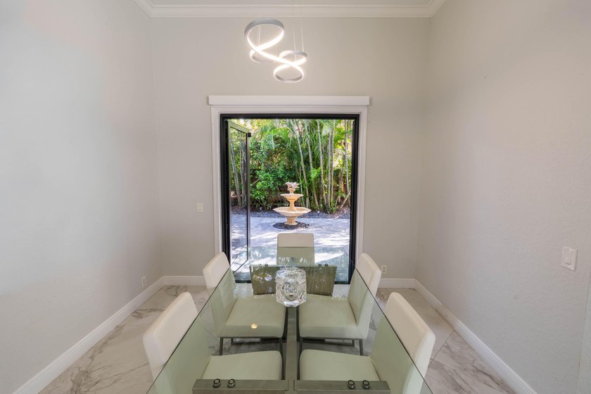 Welcome to this fully renovated lakefront home tucked away on a - photo 8