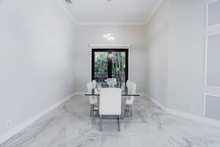 Welcome to this fully renovated lakefront home tucked away on a - photo 9