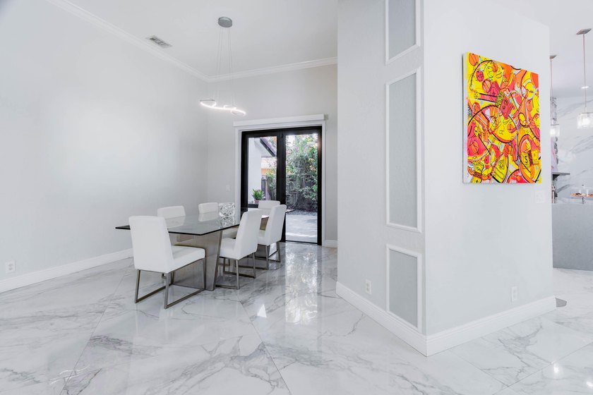 Welcome to this fully renovated lakefront home tucked away on a - photo 10