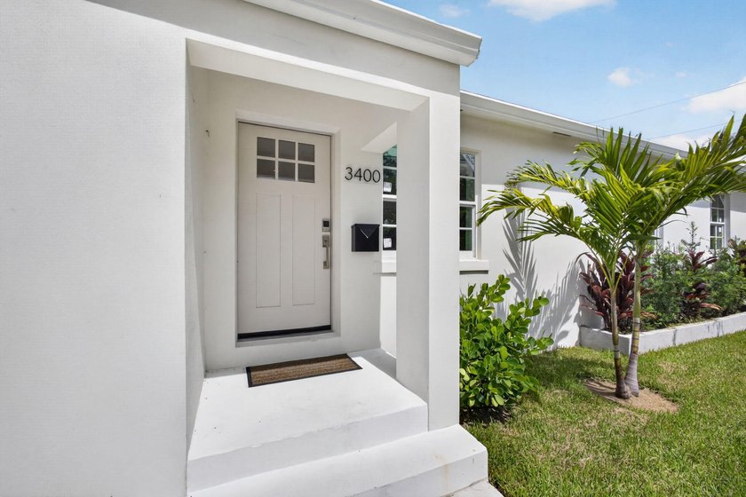 Completely rebuilt 4BR/3BA home featuring a major renovation - photo 3