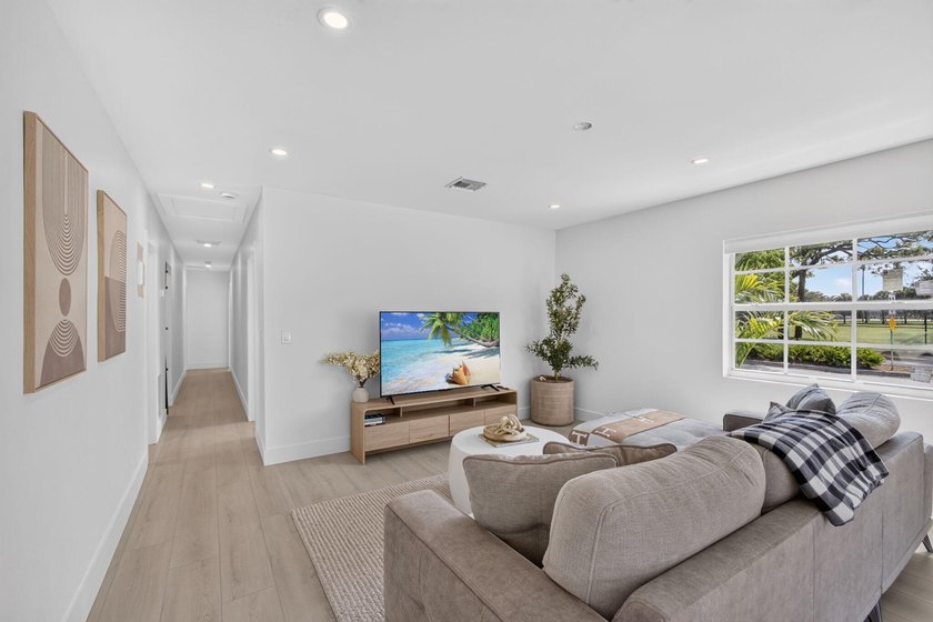 Completely rebuilt 4BR/3BA home featuring a major renovation - photo 6