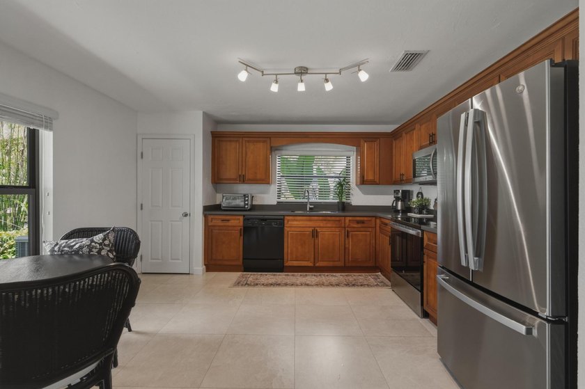 Welcome Home to your Immaculate Waterfront Corner Townhouse - photo 4