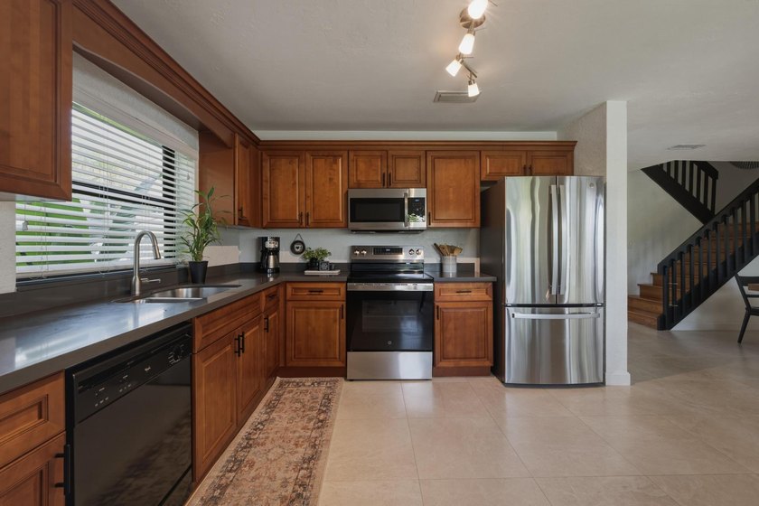 Welcome Home to your Immaculate Waterfront Corner Townhouse - photo 9