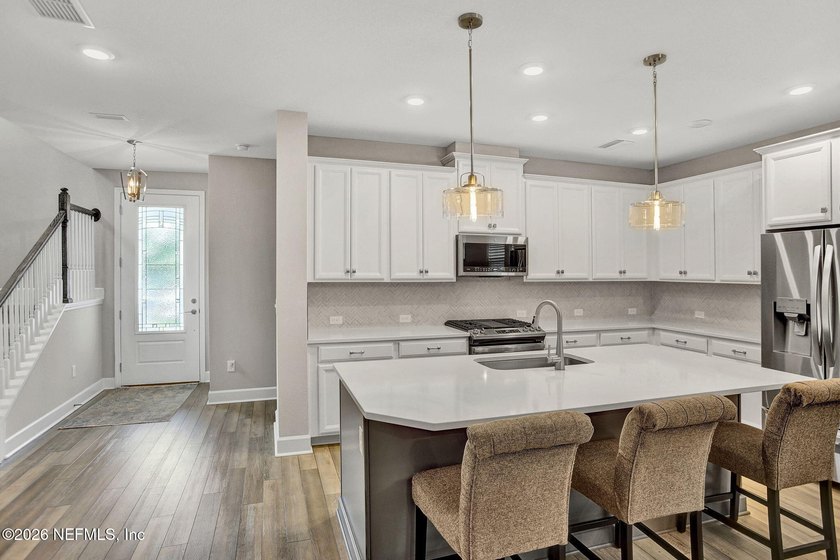 Come see this Like New 3 Year Old David Weekly Custom Home with - photo 4
