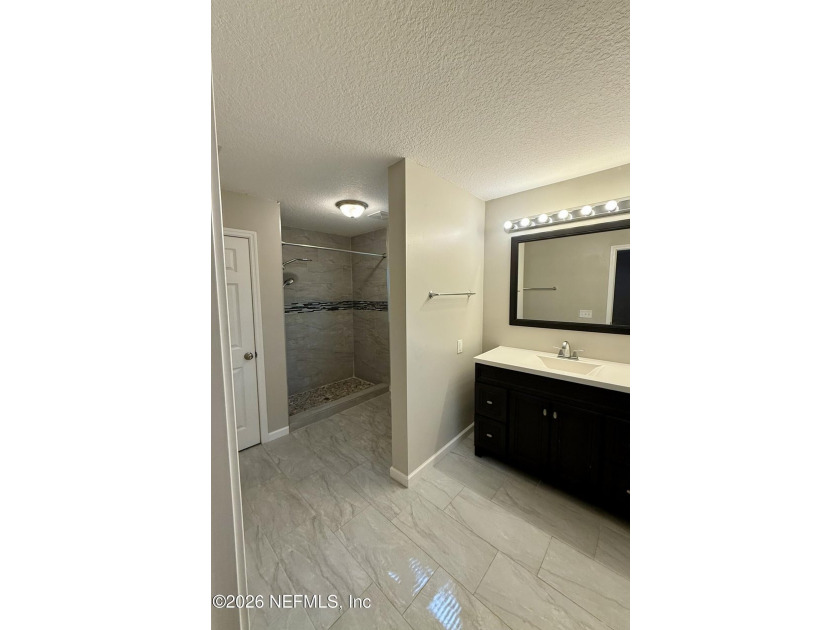 Charming three bedroom/two full bath located in the desirable - photo 8