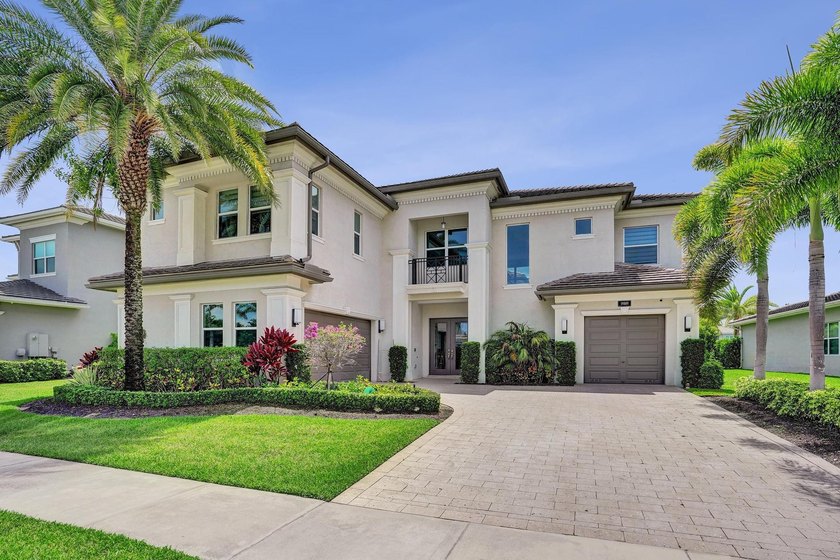 Discover elevated Florida living in this exceptional 5-bedroom - photo 3
