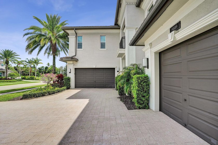 Discover elevated Florida living in this exceptional 5-bedroom - photo 5