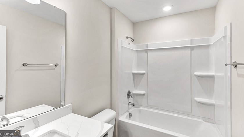 The Holly plan by Smith Family Homes is under construction in - photo 6