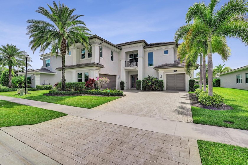 Discover elevated Florida living in this exceptional 5-bedroom - photo 8
