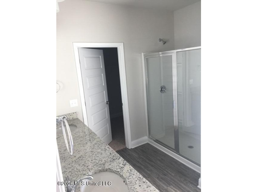 The Kaden plan features granite in the kitchen and the baths. A - photo 8