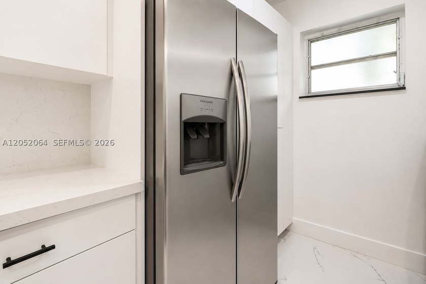Welcome to this beautifully renovated first-floor condo in the - photo 5
