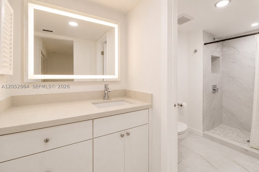 Welcome to this beautifully renovated first-floor condo in the - photo 9