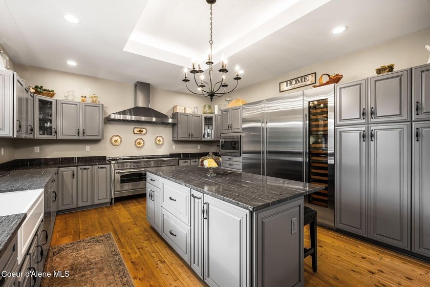Experience refined North Idaho living in this elegant French - photo 22