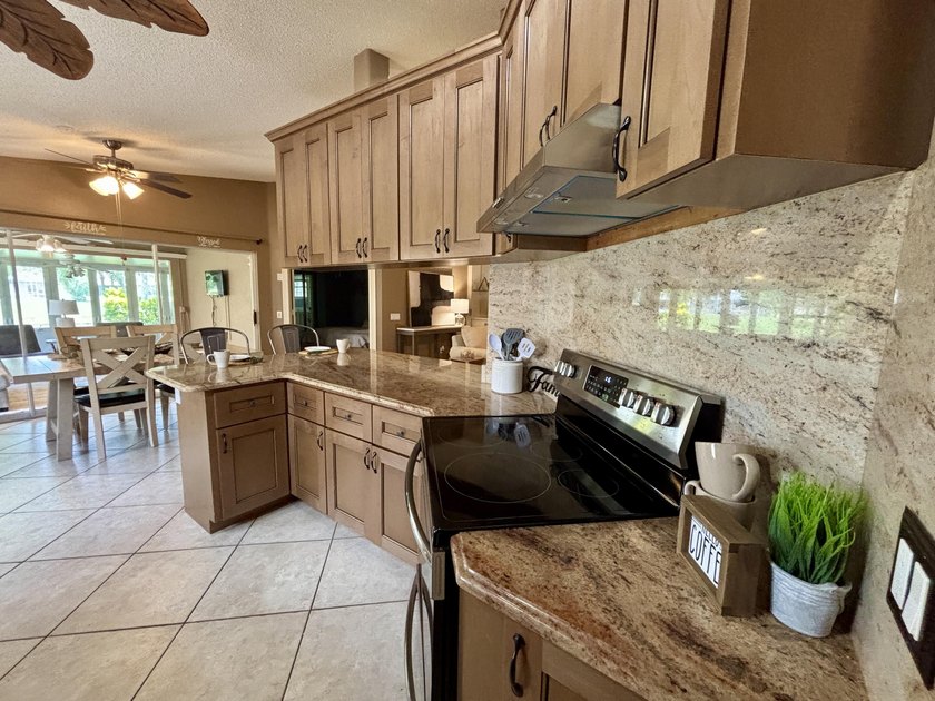 Lakefront living in the heart of St. Lucie West! This spacious - photo 7