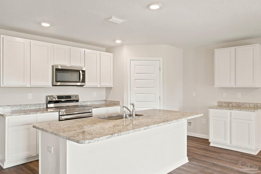 ASK ABOUT THE 4.75% ASSUMABLE LOAN OPPORTUNITY! Welcome home to - photo 15