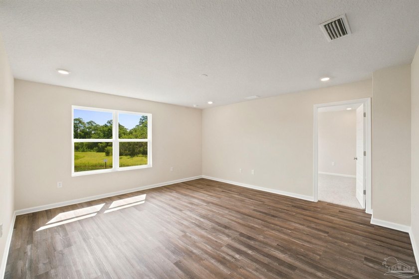 ASK ABOUT THE 4.75% ASSUMABLE LOAN OPPORTUNITY! Welcome home to - photo 17