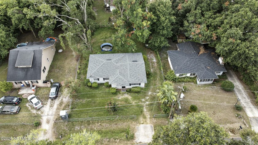 HUGE PRICE IMPROVEMENT on this 4-bedroom, 2-bath home is full of - photo 21