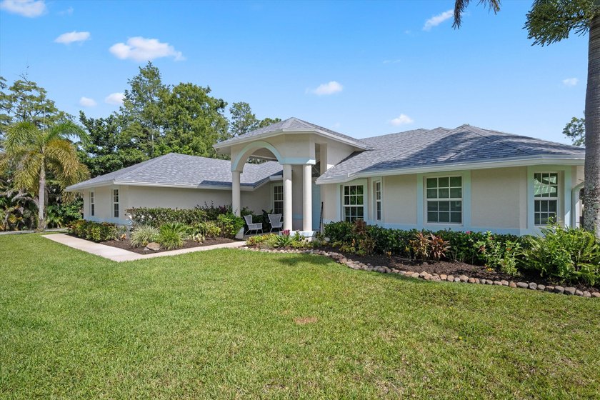 Welcome to 11414 169th Court N, a beautifully maintained - photo 5