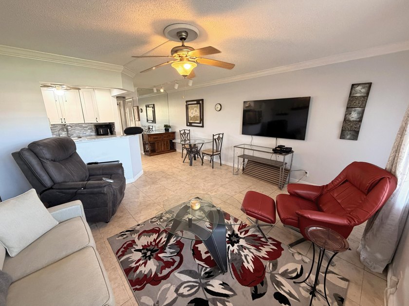 Welcome to your FIRST-FLOOR, LAKE VIEW, 1 BEDROOM CONDO in the - photo 4