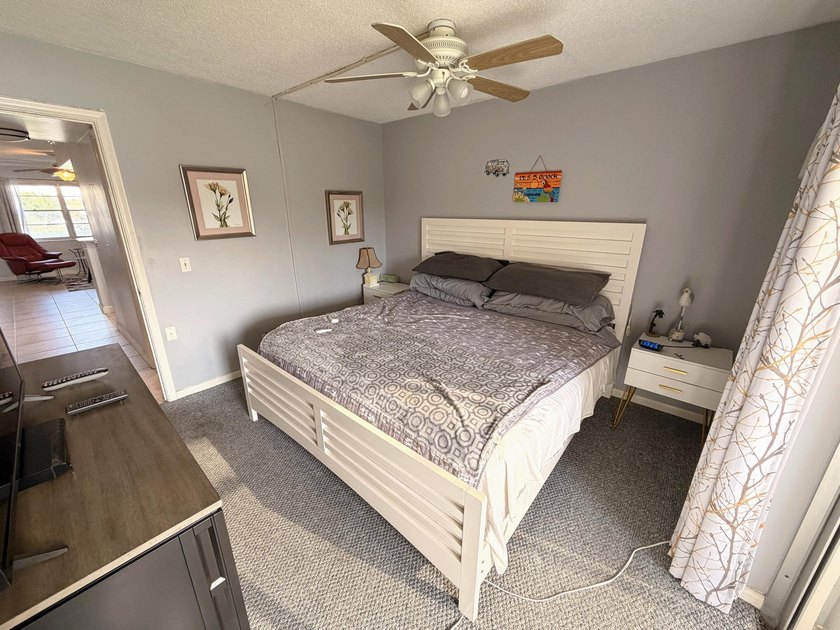 Welcome to your FIRST-FLOOR, LAKE VIEW, 1 BEDROOM CONDO in the - photo 7