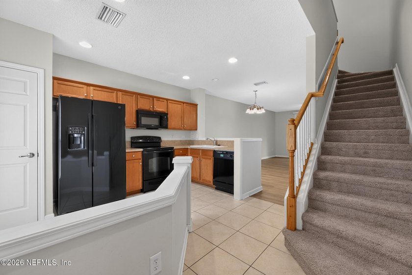 This move-in ready 2-bedroom, 2.5-bath Jacksonville home is - photo 2