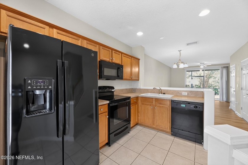 This move-in ready 2-bedroom, 2.5-bath Jacksonville home is - photo 4