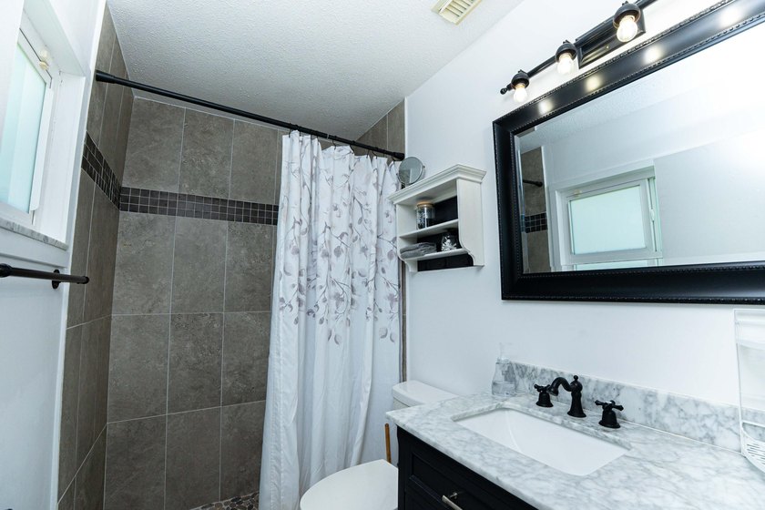 Welcome to this beautifully updated 3-bedroom, 2-bath home, this - photo 8